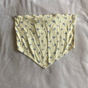 Yellow floral tube top.